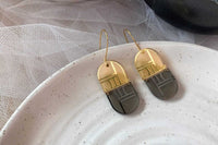 Double Arch Dangles Little Geraldine 